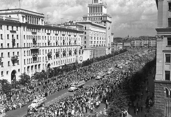 Sixth world festival of youth and students in moscow, july 28, 1957, participants on their way to lenin stadium for the opening ceremonies of the festival.