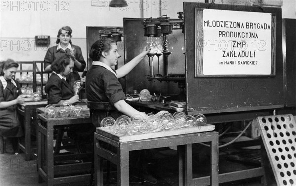 Youth taking part in the rebuilding of poland, the hanka sawicka youth brigade, leaders in electro-technical industry, late 1940s.