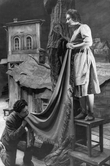 A scene from the premier performance of the play 'marriage' at the moscow state jewish theater withe, kovenskaya in the role of sorele and z, kaminsky in that of david, 1930s.