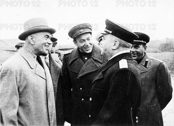 On the 4th of september at the moscow central airport, molotov, vice-chairman of the council of people's commissars for foreign affairs chatting with romanian premier p, groza.