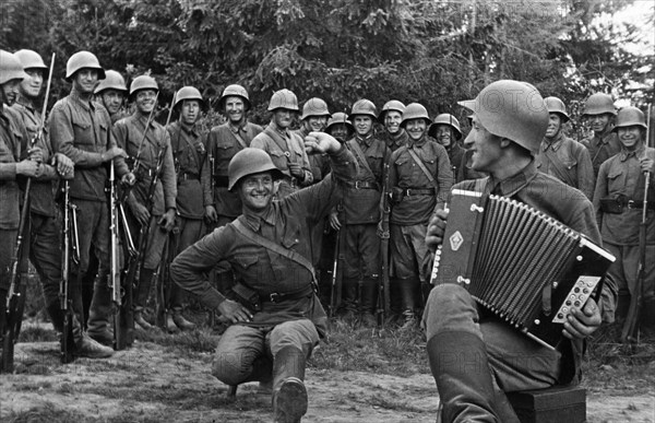 Soviet red army soldiers enjoying a bit of dancing at a summer camp of the moscow military district, july 1939.