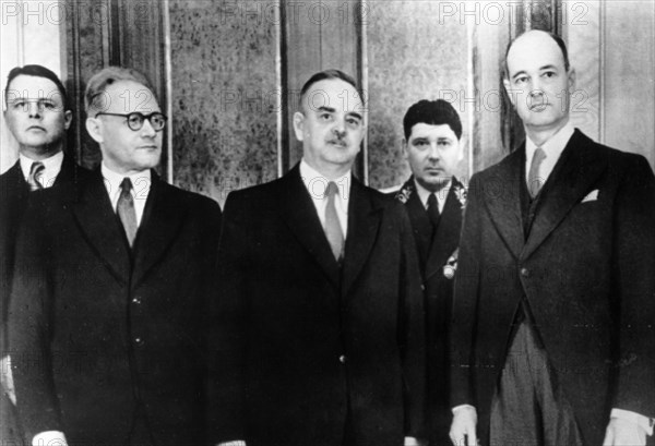 Us ambassador george f, kennan (right) standing with nikolai shvernik, president of the presidium of the soviet parliament after presenting his credentials, moscow, may 15, 1952, on the left is a,f, gorkin, secretary of the presidium.
