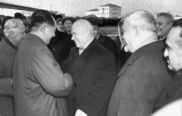 The delegation from the chinese people's republic, headed by mao zedong, arriving at vnukovo airport in moscow and being greeted by nikita khrushchev, november 2, 1957, they have come to participate in the celebrations of the 40th anniversary of the great october socialist revolution.
