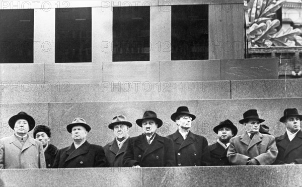 Mao zedong, n,s, khrushchev, n,a, bulganin, a,i, mikoyan, m,a, suslov, kim il sung, v, siroki (czechoslovakia), and enver hoxha (albania) on the tribune of the lenin-stalin mausoleum during the november 7th parade, 1957.