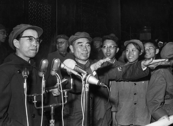 Jiang qing (mme, mao) and zhou enlai greeting the 500,000 red guards, revolutionary teachers and students at a massive rally in tienanmen square in beijing on august 31, 1966.