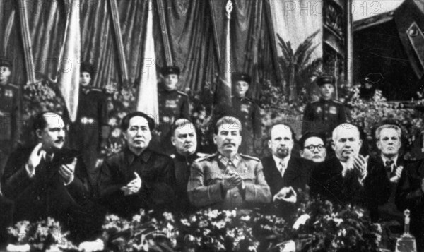 Communist leaders from two continents at the bolshoi theater in moscow at a meeting in honor of josef stalin's 70th birthday on december 21, 1949, (left to right: politburo member l,m, kaganovich; chairman mao zedong; armed forces minister marshal n,a, bulganin; stalin; walter ulbricht, deputy premier of the east german government; j, cedenbal; n,s, khrushchev, chief of the ukrainian council of ministers; i, koplenig).