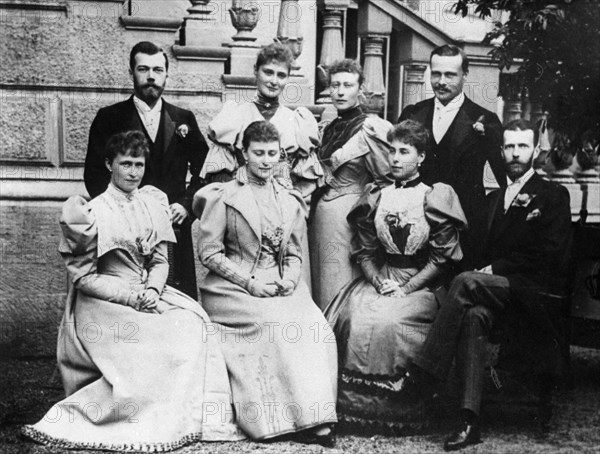 A romanov family portrait c, 1890, nicholas ll (standing left), grand duke sergei alexandrovich (sitting right) and his wife elisabeth fyodorovna (second fom left).