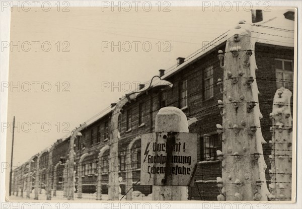 Photo-series on the hitlerite death camp in oswiecim,  segregated from the world by the barbed wire, hundreds of thousands of people met excruciating death in the camp,  in the these huge brick blocks day and night the german hangmen murdered people by electric current, and then the bodies were lowered to the incinerator,  the bones of the victims were crushed and used as a fertilizer, february, 1945.