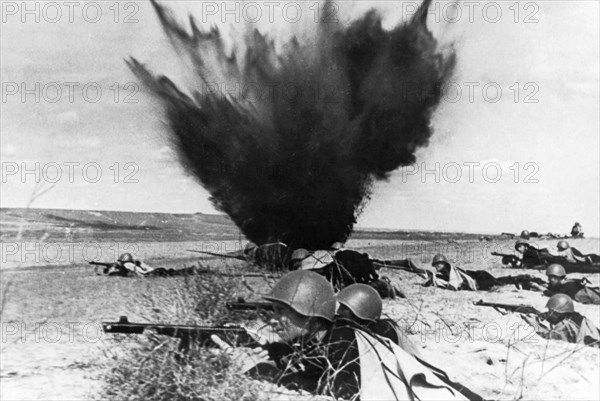 Dismounted cossacks in an offensive action, these cavalrymen ride to a point of attack, the two of every three men dismount, leave their horses in the care of the third and continue their attack on foot, world war 2, 1942.