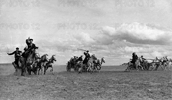Cossack machine-gun carriages advancing to the firing lines during world war ll, may 1942.