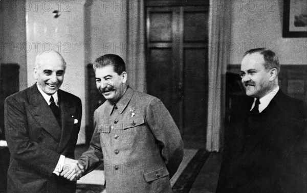 Mission to moscow', us ambassador joseph davies shaking hands with joseph stalin during his second mission to moscow; in may of 1943 he was ordered by roosevelt to show the film to stalin, this marks one of the first instances of the use of film as a means of diplomatic soft power, vyacheslav molotov is on the right.