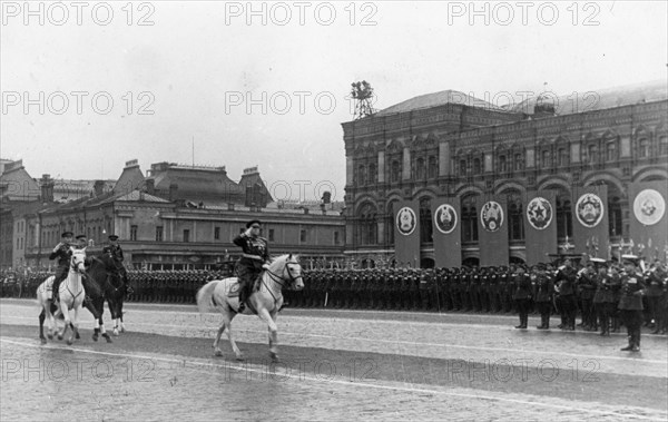 Marshal georgy zhukov accompanied by commander of the parade, marshal of the soviet union, k, rokossovsky riding across red square prior to the victory parade on june 24, 1945.