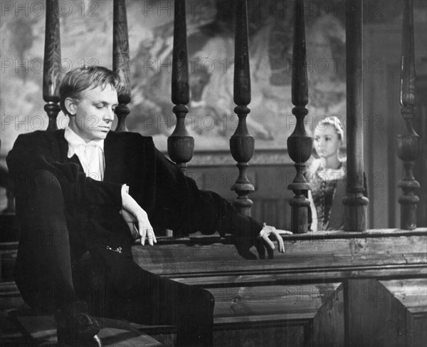 A scene from a film version of 'hamlet' directed by grigori kozintsev and starring innokenti smoktunovsky, the score was composed by dimitry shostakovich, ophelia is being played by anastsia vertinskaya.