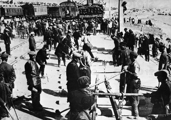 The last ties being laid for the trans-siberian railroad in 1916 (?).