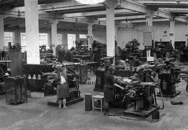 Men and women workers in a farm machine factory, rostov-on-don, soviet union, 1930.