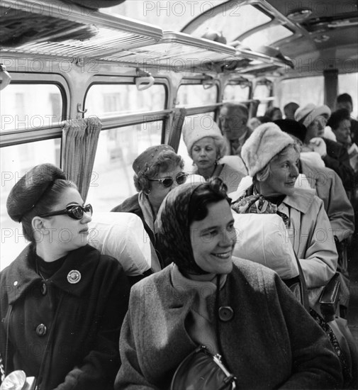A group of american tourists on a bus on their way to the resorts 'friendship' and 'golden beach' in bulgaria, late 1950s.