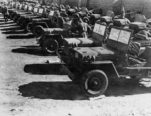 Soviet red army soldiers with us-made jeeps on the way to the front, world war 2, american aid, lend lease program.