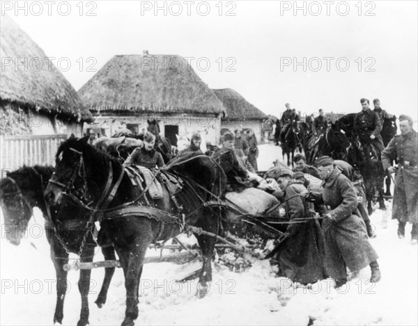 Fascists taking away food robbed of the local population in kharkhov region, 1942.