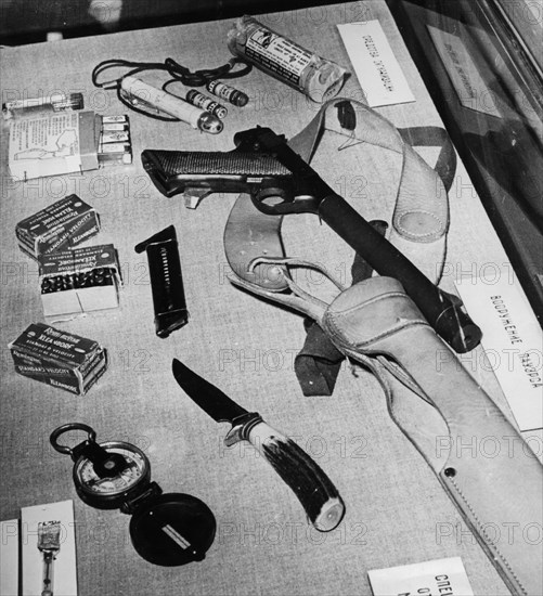 Parts of the emergency military survival kit found in u2 spy plane when pilot francis gary powers was shot down over soviet territory on may 1, 1960, ussr, put on display during his moscow trial, august 1960.