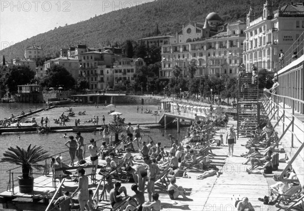 Popular beach of opatija on the adriatic coast, yugoslavia, mid 1960s.