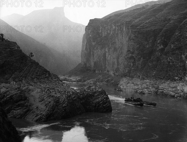 Two cargo ships in chu-tang gorge, one of the three gorges of the yangtze river, szechuan province, china, 1950s.