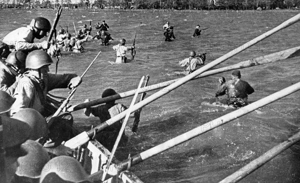 Baltic fleet, a detachment landing from boats in the leningrad area, making a commando type raid, (1940s or 1950s?).