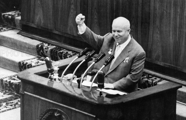 Nikita khrushchev speaking from the rostrum of the 3rd soviet writers' congress, 'long live soviet writers, loyal assistants of our party in the upbuilding of communism!', from the newspaper 'sovetskaya kultura', may 24, 1959.
