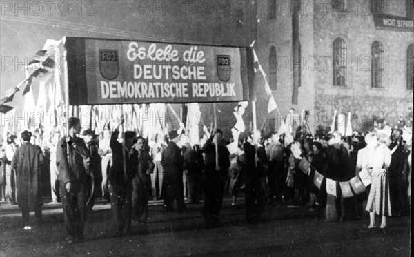 A mighty demonstration was held in berlin in the evening of october 11, 1949 on the occasion of the foundation of the gdr on october 7, 1949, the demonstration was led by members of the free german youth organization.