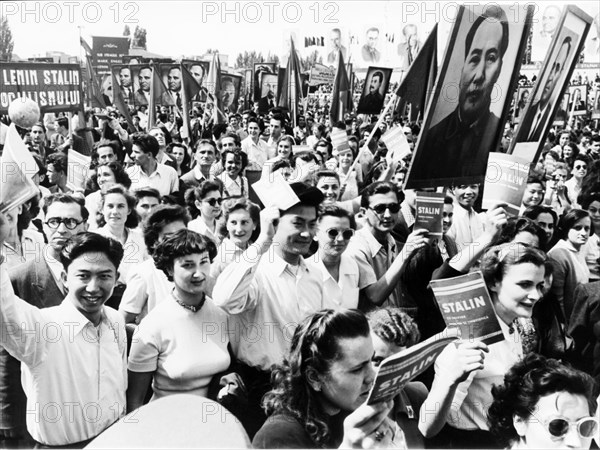 Students with mao's portrait in the may day demonstration in bucharest, in 1952.