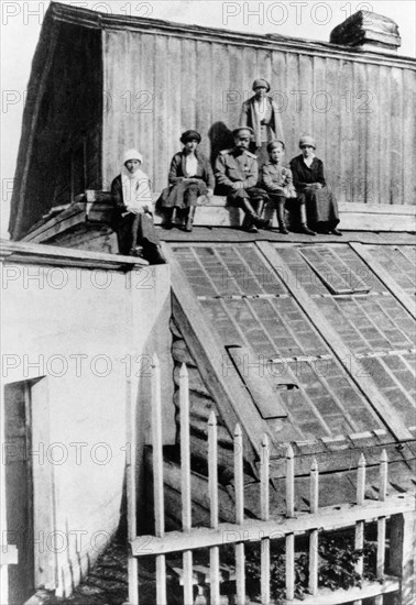 tsar nicholas ll with his family (son, alexei and daughters, olga, maria, anastasia and tatiana) on the roof of the house in tobolsk where they were held in 1918 before being transferred to yekaterinberg (sverdlovsk) to be shot.