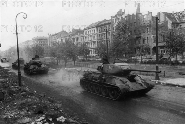 Soviet t-34 tanks on a street in berlin, may 1945, world war 2, fall of nazi germany.