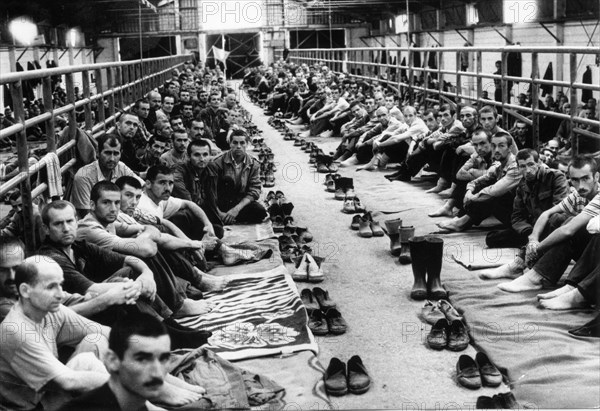 Malnourished croatian and bosnian muslim prisoners of war in manjaca, the largest serbian concentration camp, serbia, 1992.