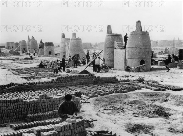 Newly-built small blast furnaces at yingshuichiao iron smelting works in chungwei county, china, great leap forward, 1950s.