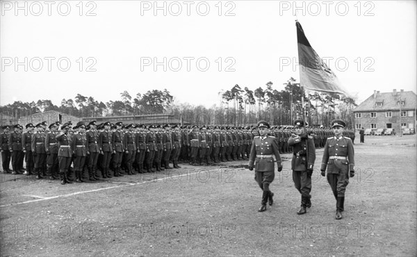 The first regiment of the national people's army of the gdr was festively sworn in on april 30, 1956.