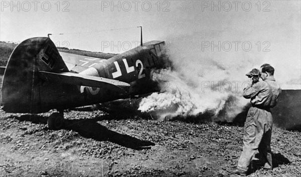 David sholomovich, cameraman and major in the soviet aviation forces, filming a burning messerschmitt mb-4-1 shot down by soviet flying ace captain tarasov during world war 2.