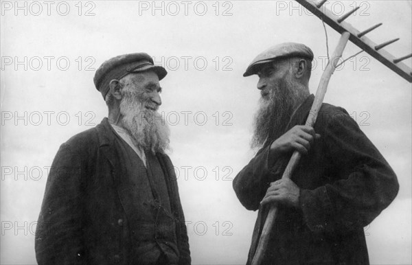 A jewish kolkhoz in stalindorf - national jewish district, ukraine, ussr, itsik medvedev, all his life a poor day laborer at a rich local miller's, and shmeel godtman, a window framer; both found a safe and restfull life in the collective.