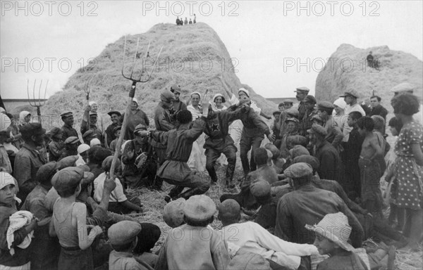 A jewish kolkhoz in stalindorf - national jewish district, ukraine, ussr, recreation in the fields during dinner hour.