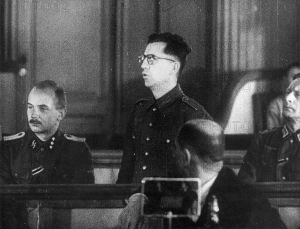 World war 2, december 18, 1943, still from a film on the kharkov trial produced by artkino, reinhard retzlaw making his last plea, he asked for mercy because he was under military orders when he committed the crimes of which he is being accused of, he pleaded for an opportunty to return to germany to expose hitler propaganda.