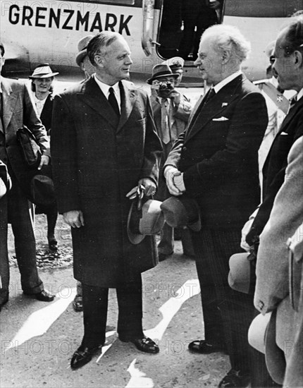 German minister for foreign affairs, joachim von ribbentrop (left), arrives at the central airport in moscow for the signing of the treaty of non-aggression between germany and the union of soviet socialist republics on august 23, 1939, greeting him is v, potemkin, vice commissar for foreign affairs for the ussr.