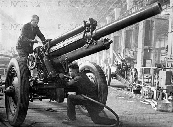 Final assembly operations at a weapons factory in the urals, 1942.