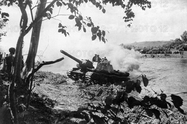 World war 2, an su-152 self-propelled howitzer (152mm) on a heavy tank chassis, crossing a river, ukraine.