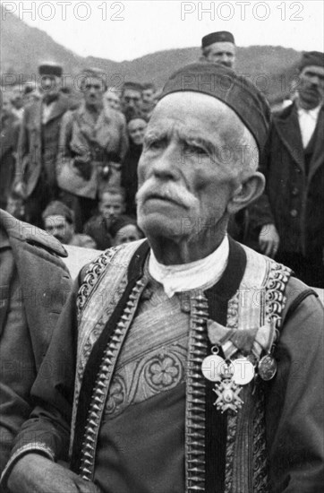 World war 2, rade dedich, an old soldier of the yugoslavian army, decorated for service in world war 1 against germany and austro-hungary, he is now in the yugoslavian guerilla army fighting the germans.
