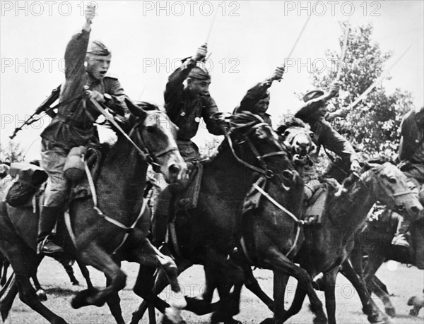 Red army cavalry charge with sabers drawn, following the tanks into the action, world war ll.