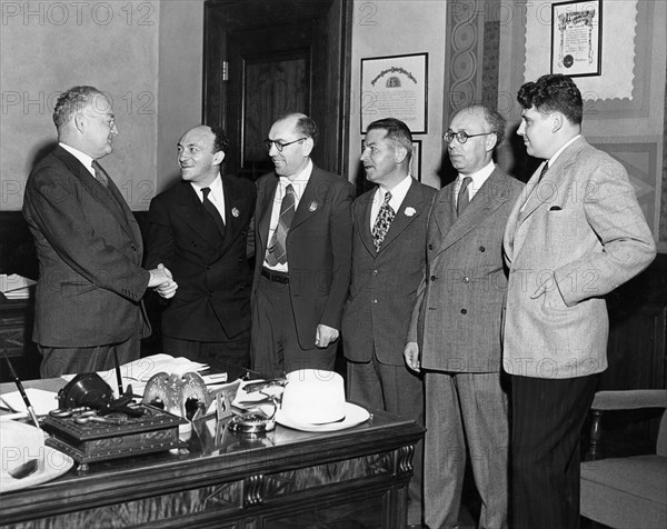 Mayor fletcher bowron of los angeles (left) meeting with professor solomon mikhoels and lt, colonel itzik feffer, officers of the jewish anti-fascist committee, during their fund-raising trip to the united states in 1943, next to them are (l to r) judge isaac pacht, head of the la reception committee, attorney chaim shapiro, and v,v, pastoyev, soviet consul of los angeles.