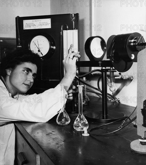 A young woman performing an experiment at the peat science laboratory at the higher school of rural economy in warsaw, poland may 1964, there are now more than three times more academic schools than before the war, the number of scientific research workers increased five-fold while the number of first year students in the academic year 1963/64 is far greater than the total number of students in all years of studies in all polish academic schools in the last pre-war year.