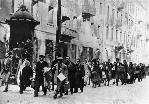 World war 2, residents of the warsaw ghetto on the way to a death camp, poland early 1940s.