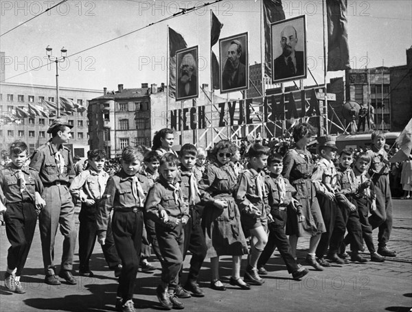Polish young pioneers marching on may day in warsaw, poland, may 1, 1958.