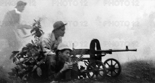Tet offensive, south vietnamese plaf (people's liberation armed forces) soldiers firing on enemy troops in south vietnam, 1968.