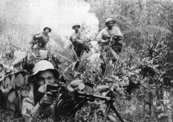 Tet offensive, south vietnamese plaf (people's liberation armed forces) soldiers firing on enemy troops in south vietnam, 1968.