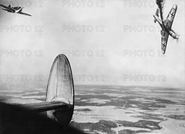 German plane being shot down by soviet planes during a dogfight in march 1942.